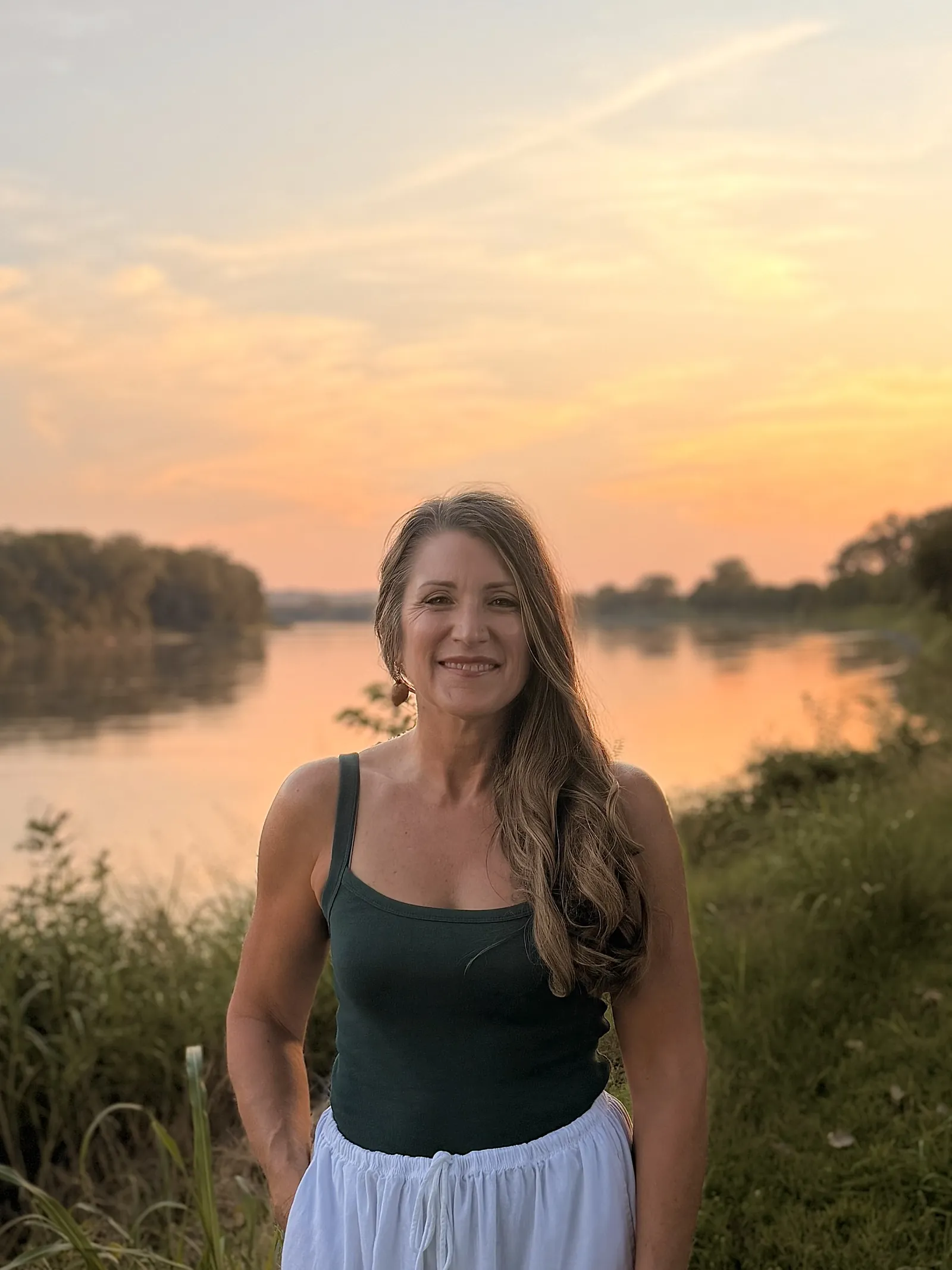 Smiling portrait of Teresa Nerem, owner of Soul Balm Massage Therapy